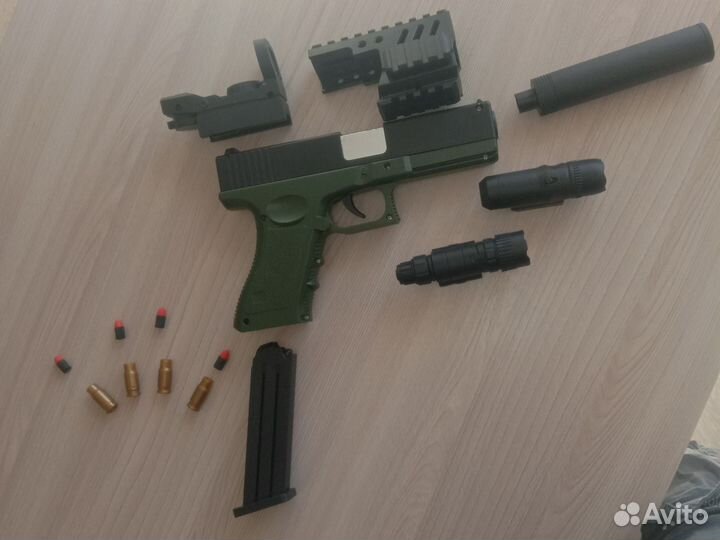 Игрушечный пистолет 