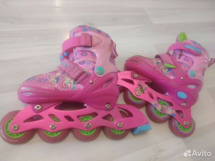 Роликовые коньки