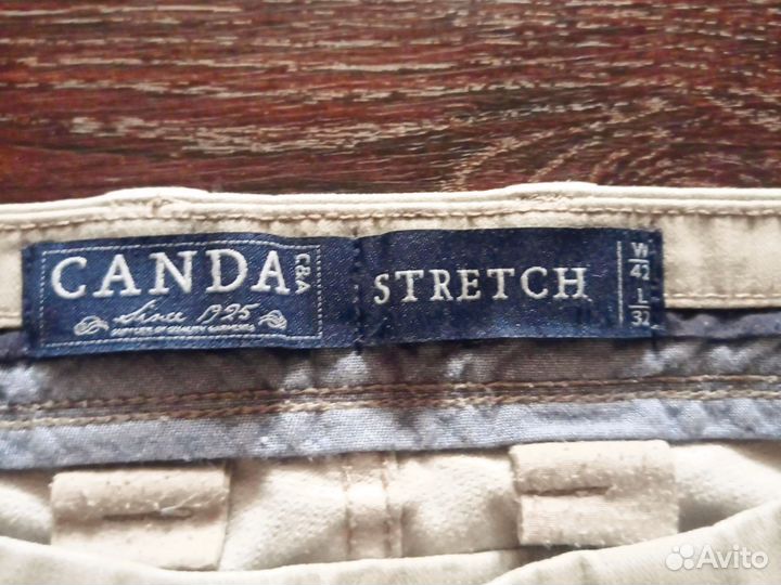 Пуховик зимний женский и джинсы