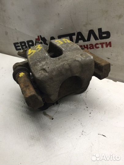 Суппорт тормозной задний правый Renault Megan 2