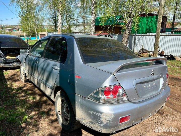 Кузов по кусочкам mitsubishi lancer 9 2л