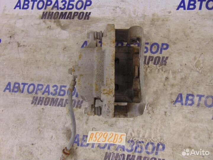 Суппорт передний правый для Nissan X-Trail 1 2001