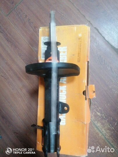 Амортизатор задний левый Toyota Corolla 1997-2002