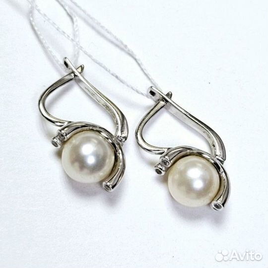 Золотые серьги с бриллиантом