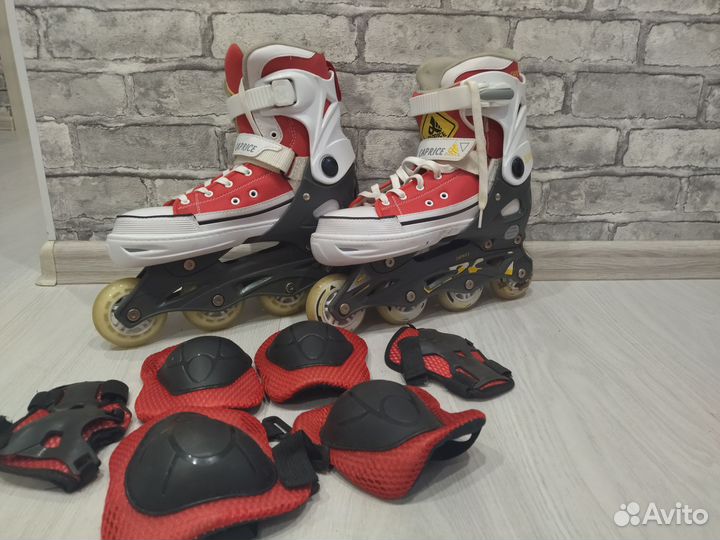 Роликовые коньки