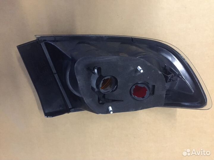 Фонарь задний левый внешний Mazda 3