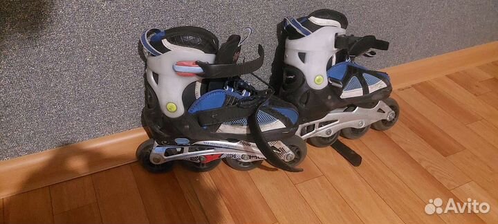 Роликовые коньки