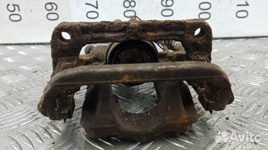 Суппорт тормозной задний правый opel astra J (NEA2