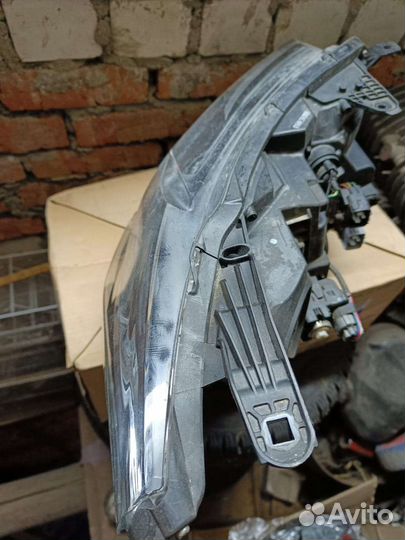 Фара левая Mitsubishi pajero sport 3