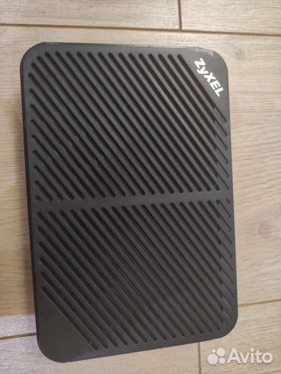 Интернет центр Zyxel adsl2+ с wifi 802.11n 300Мбит