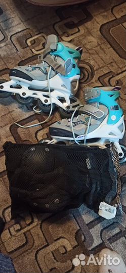 Роликовые коньки