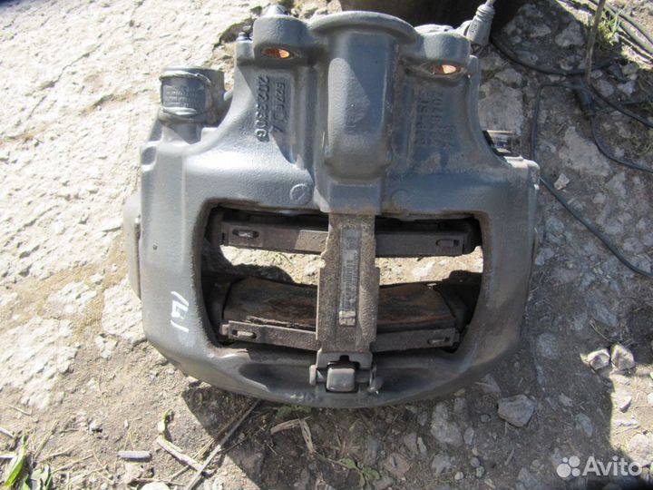 Суппорт тормозной задний левый Mercedes Benz Actro