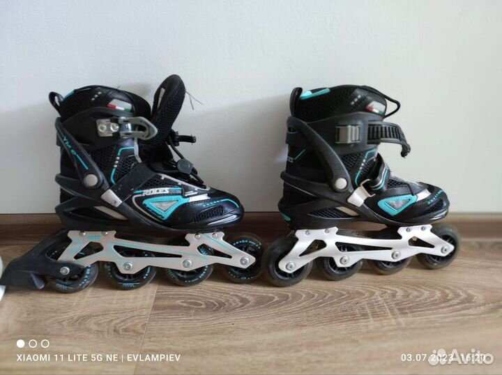 Роликовые коньки