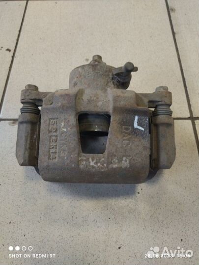 Суппорт тормозной передний левый Daewoo Nexia