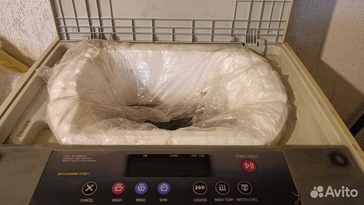 Стиральная машина с вертикальной загрузкой