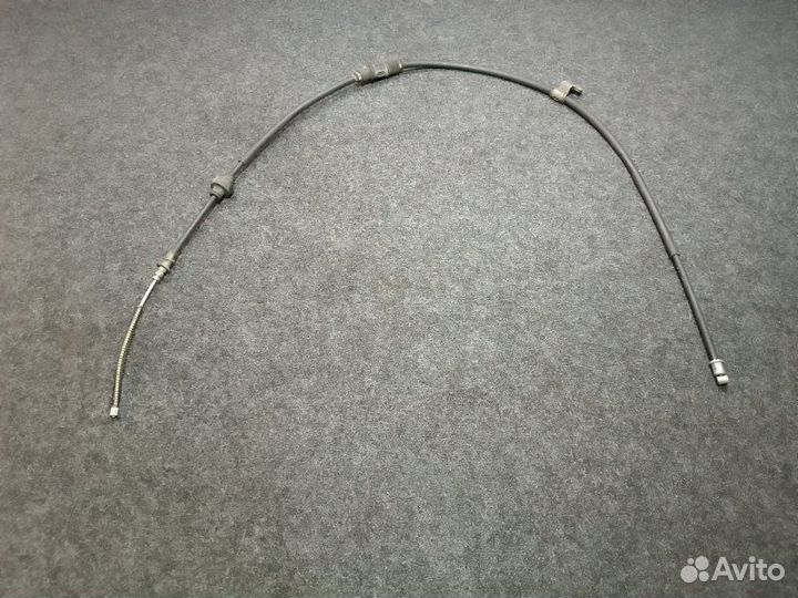 Трос стояночного тормоза задний правый Mitsubishi