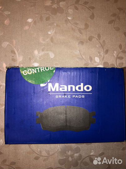 Колодки тормозные kia rio 3 передние Mando