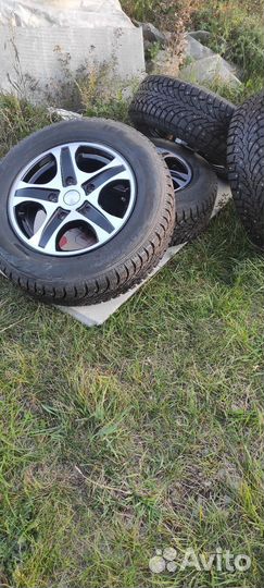 Нива. Зимняя шипованная резина на литых дисках