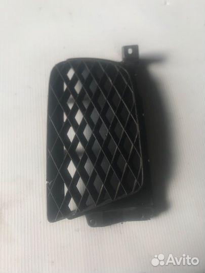 Заглушка бампера передняя правая Mazda Capella