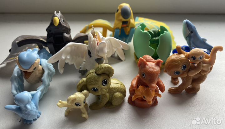 Игрушки киндер сюрприз звери и птицы с вкладишами