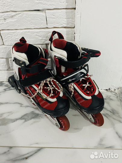 Роликовые коньки