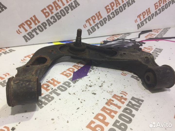 Ниссан Навара Рычаг передний левый верхний