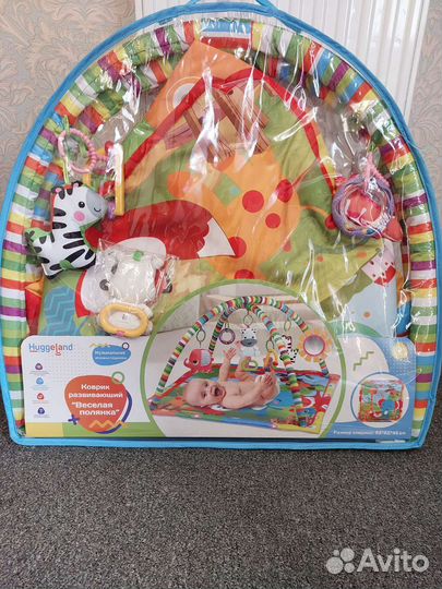 Развивающий коврик н Huggeland новый
