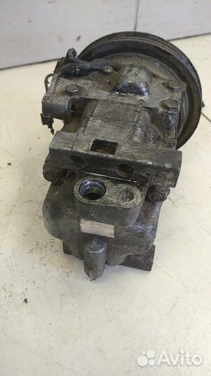 Компрессор кондиционера Mazda Familia