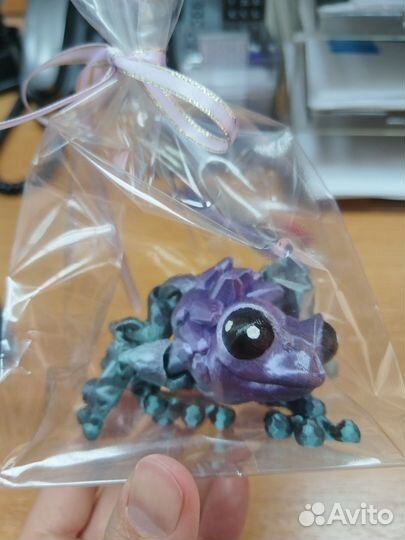 Игрушка лягушка