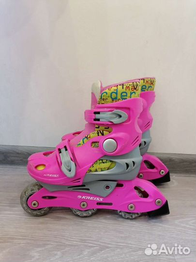 Роликовые коньки