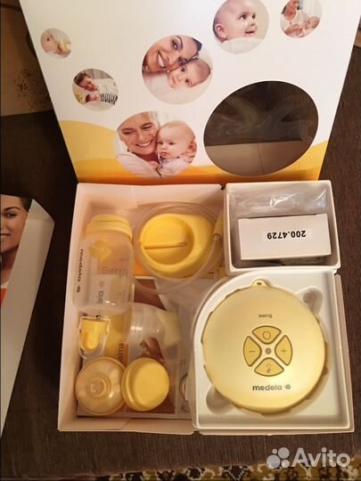 Молокоотсос Medela Swing электрический