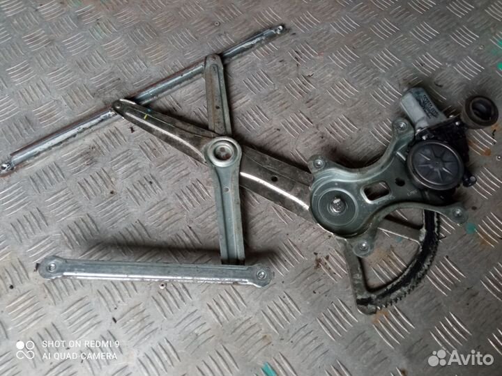 Стеклоподъёмник передний левый Toyota Hilux 7