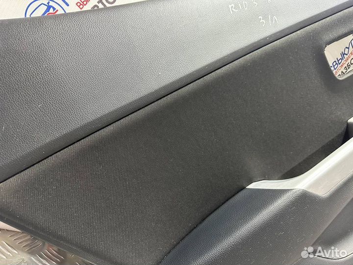 Обшивка двери Kia Rio 3