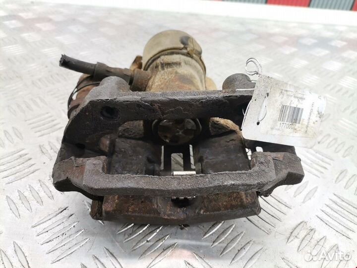 Суппорт задний правый Ford Cougar 9 1999