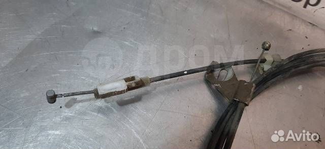 Трос открывания бака (багажника) Nissan March K11