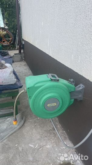 Hozelock самосматывающая катушкасо шлангом