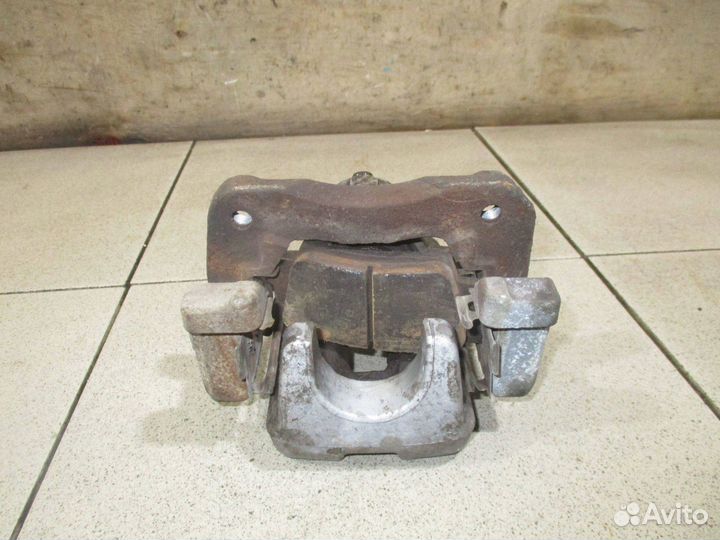 Суппорт задний левый Toyota Camry 50