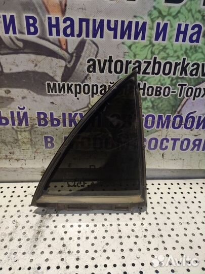Стекло собачника заднее правое Toyota Corolla