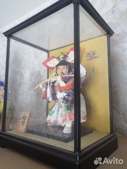 Японская кукла в колбе