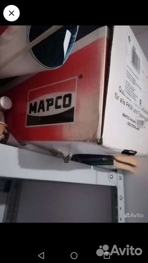 Амортизатор Мазда 323 1998-2003