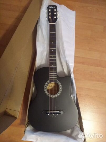 Гитара новая