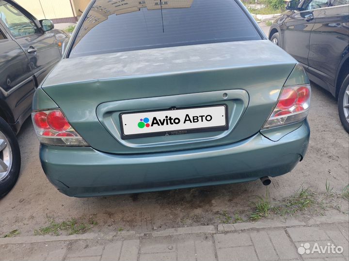 Mitsubishi Lancer 1.6 МТ, 2006, 237 500 км