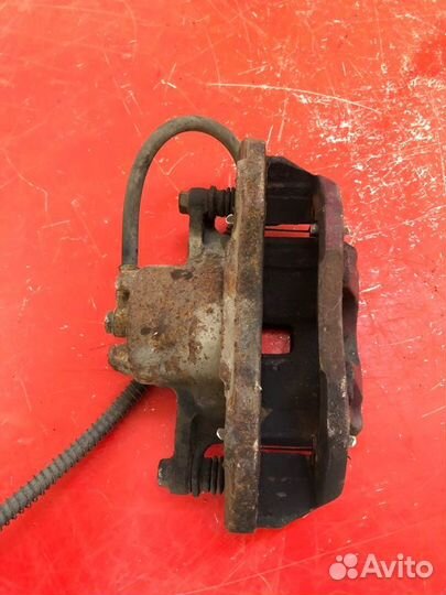 Суппорт тормозной задний правый Mitsubishi Lancer