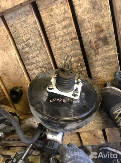 Вакуумник в сборе с гтц Hyundai Sonata 4 EF