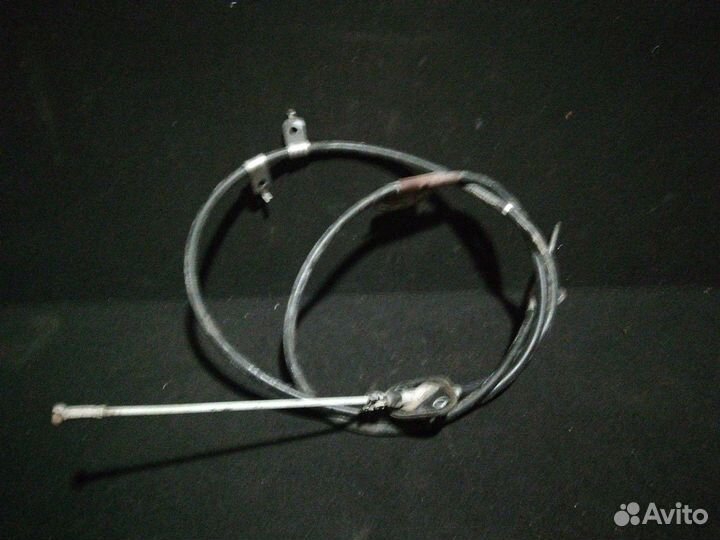Трос стояночного тормоза (центральный)