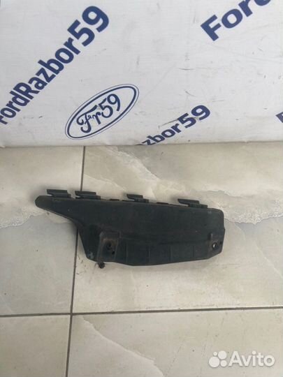 Кронштейн фары нижний правый Hyundai I20 PB