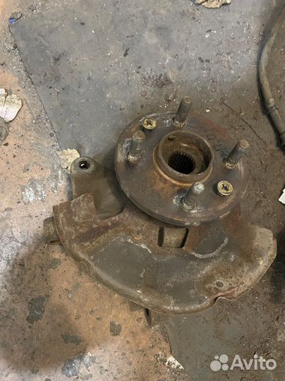 Киа спектра 2008г кулак поворотный передний левый