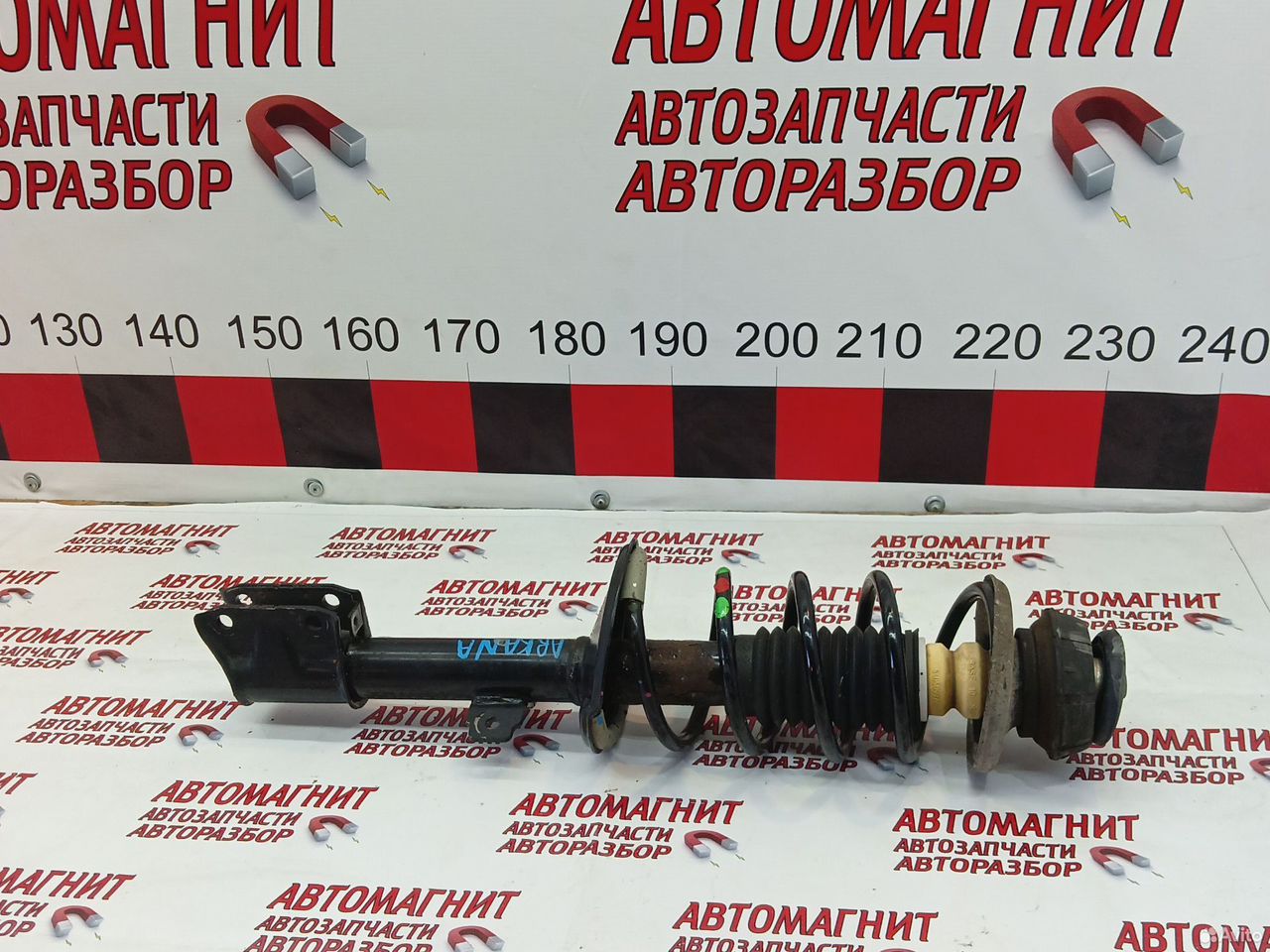 Амортизатор стойка передняя Рено Аркана