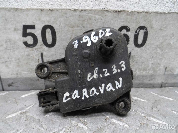 Моторчик заслонки печки Dodge Caravan 4 04885465AC