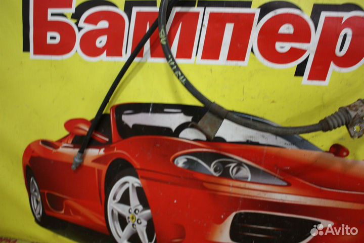 Трос стояночного тормоза левый Mitsubishi Outlande